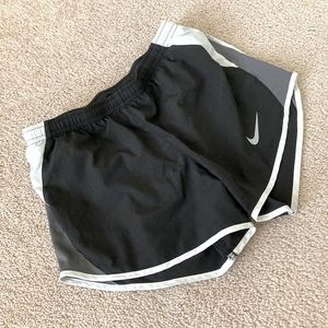 Slightly worn Nike running shorts, size xsmall, black with white and gray sides